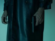 Aniah Blanchard: otmica sa benzinske pumpe i suđenje za teško ubistvo u Alabami Close-up of an unrecognizable person holding a pistol, creating a mysterious and suspenseful mood.