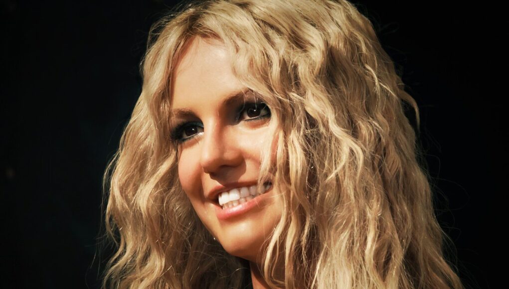 a close up of a person with blonde hair