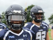 Bivši NFL igrač Darron Lee osumnjičen za ubistvo devojke u SAD Close-up of American football players in action, wearing helmets and jerseys, showcasing team spirit.