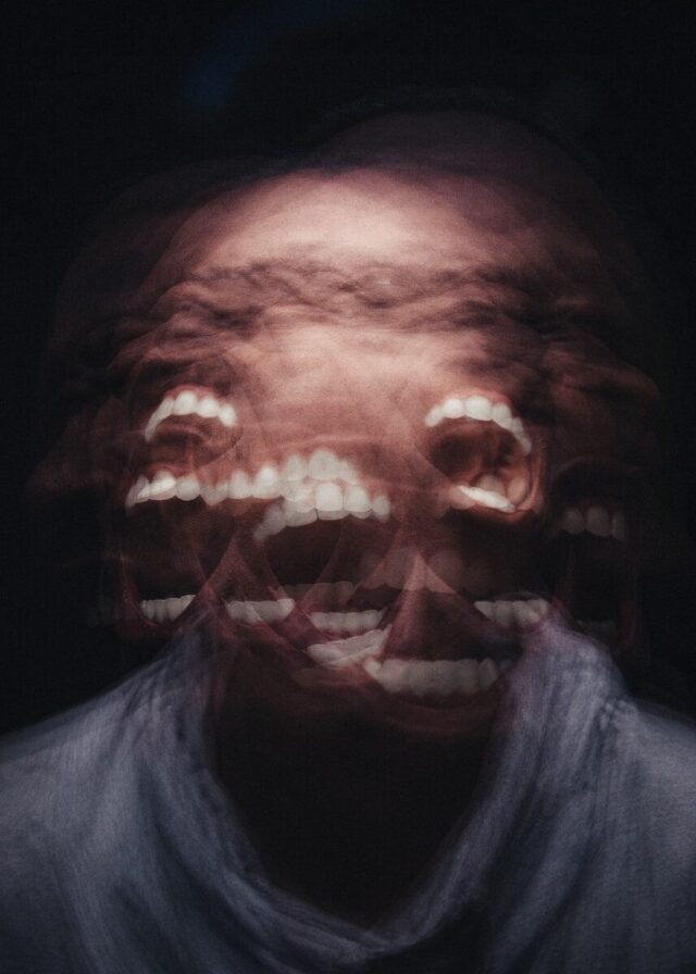 Photo by Nsey Benajah mans face with white scarf