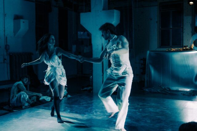 Couple dancing in a dimly lit room