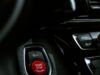 Jedna greška za volanom može promeniti nekoliko života: Najčešći trenuci koji prethode teškim saobraćajnim nesrećama Detailed view of a start stop engine button in a car interior, highlighting modern automotive design.